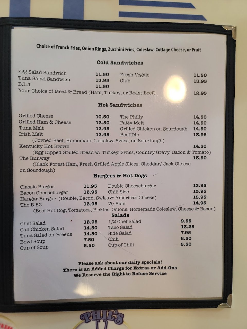 Printed menu with sandwiches and salads